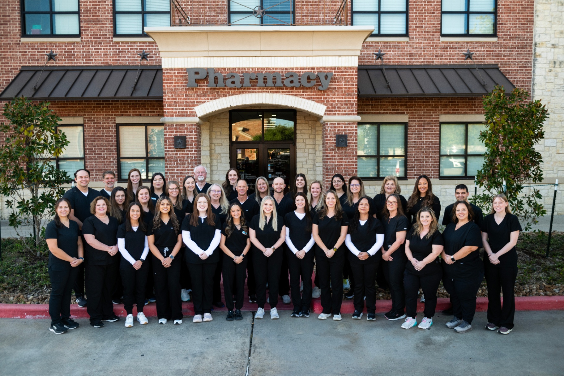 The Magnolia Pharmacy team gathered outside our Magnolia, Texas pharmacy